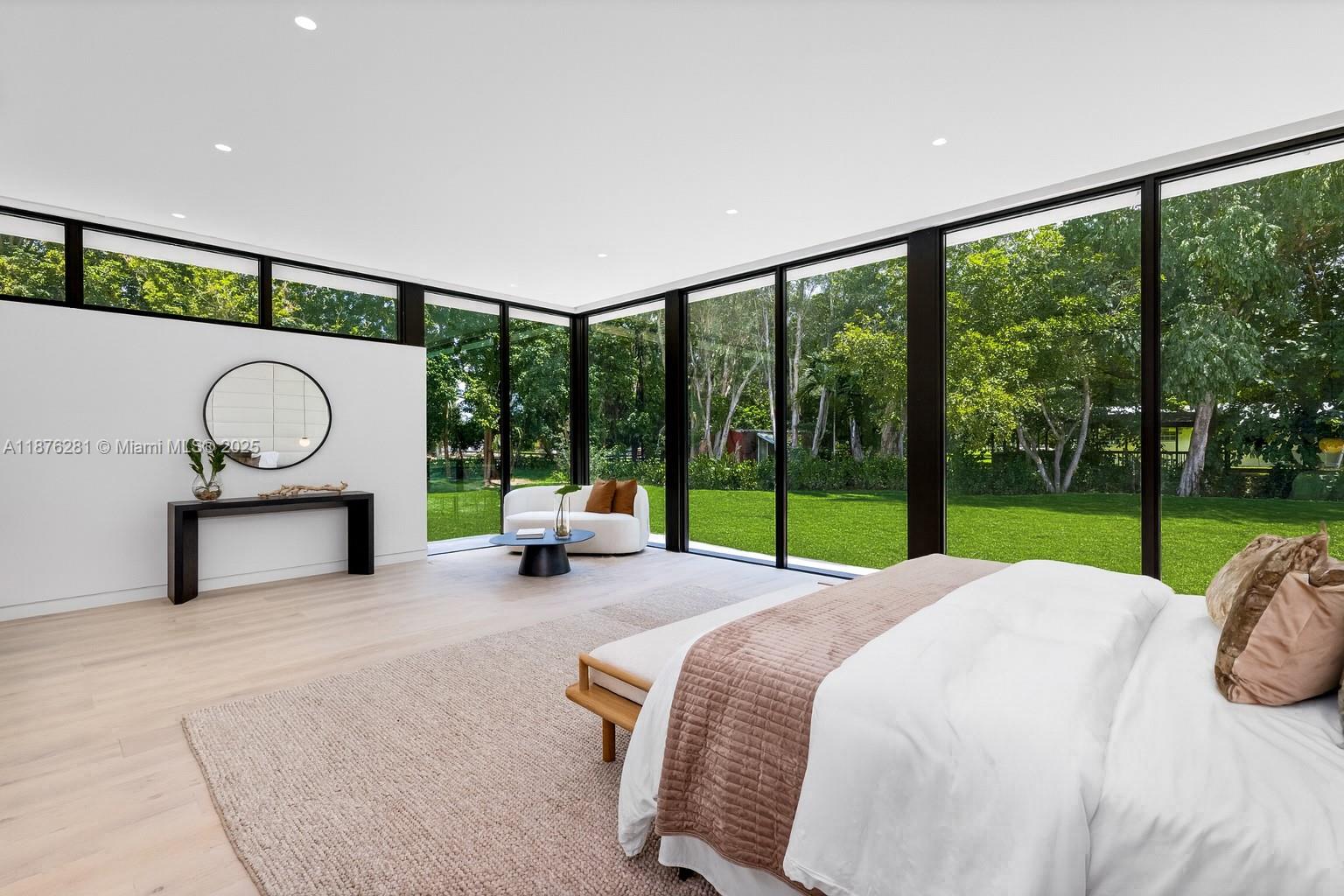 5671 Southwest 130th Avenue Southwest Ranches, FL 33330 - Photo 19 of 47 a bed room with a bed and a view of balcony