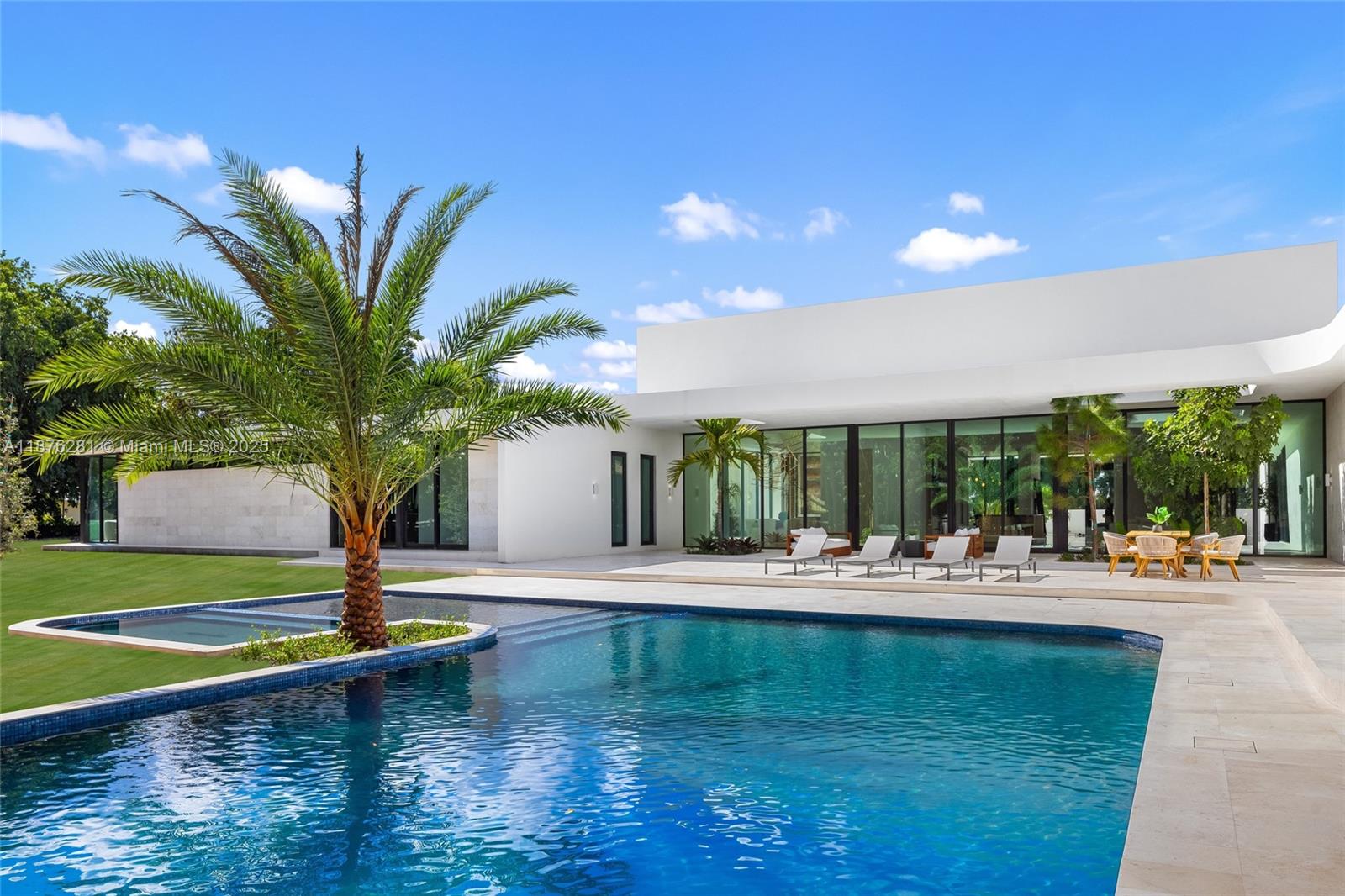 5671 Southwest 130th Avenue Southwest Ranches, FL 33330 - Photo 2 of 47 a view of a swimming pool with an outdoor seating