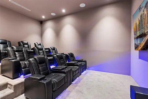 an empty room with wooden floor and a window