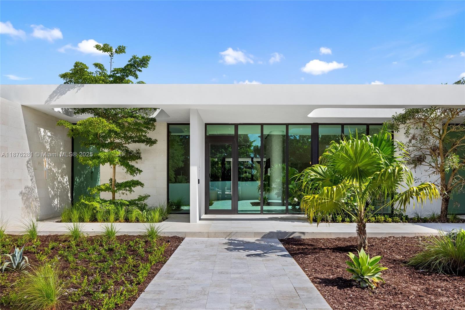 5671 Southwest 130th Avenue Southwest Ranches, FL 33330 - Photo 3 of 47 a front view of a house with a porch
