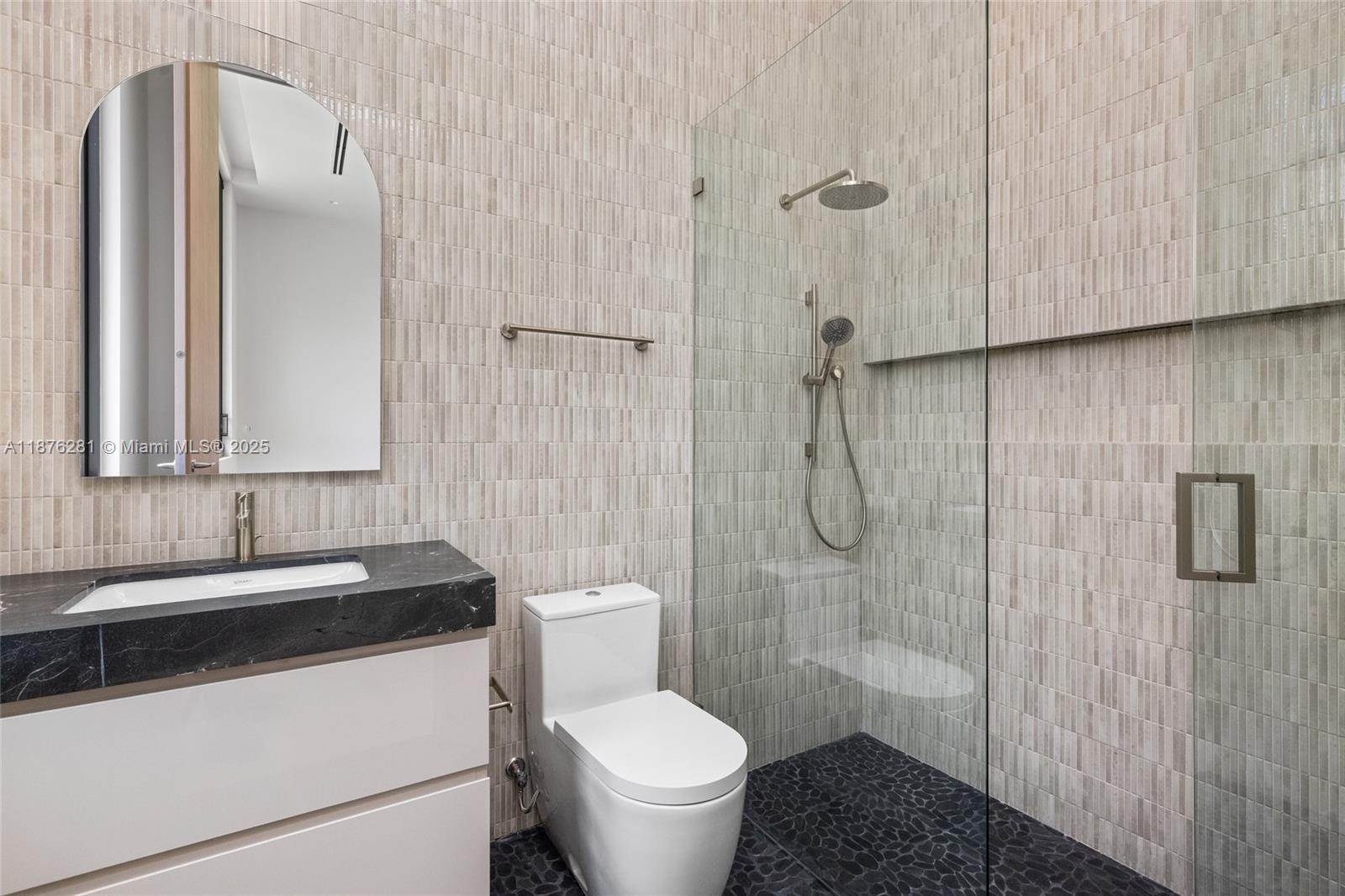 5671 Southwest 130th Avenue Southwest Ranches, FL 33330 - Photo 31 of 47 a bathroom with a sink toilet and shower