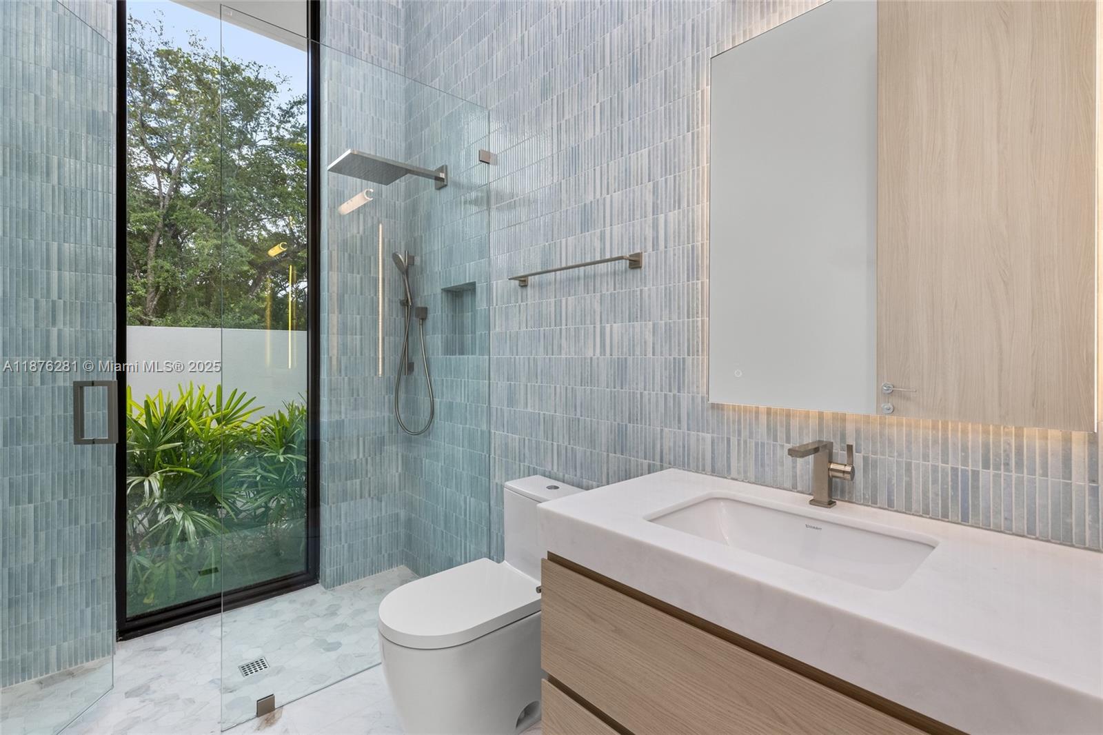 5671 Southwest 130th Avenue Southwest Ranches, FL 33330 - Photo 37 of 47 a bathroom with a sink toilet and shower