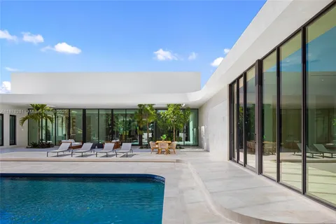 a view of an chairs and tables in the patio