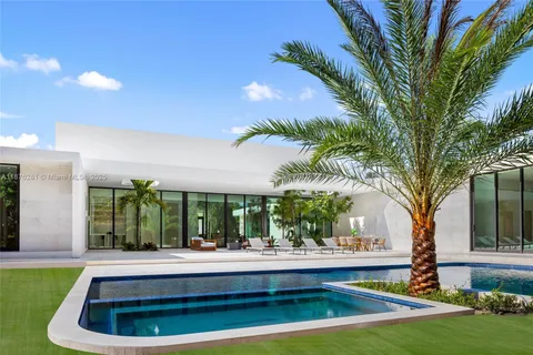 a outdoor space with patio furniture and potted plants