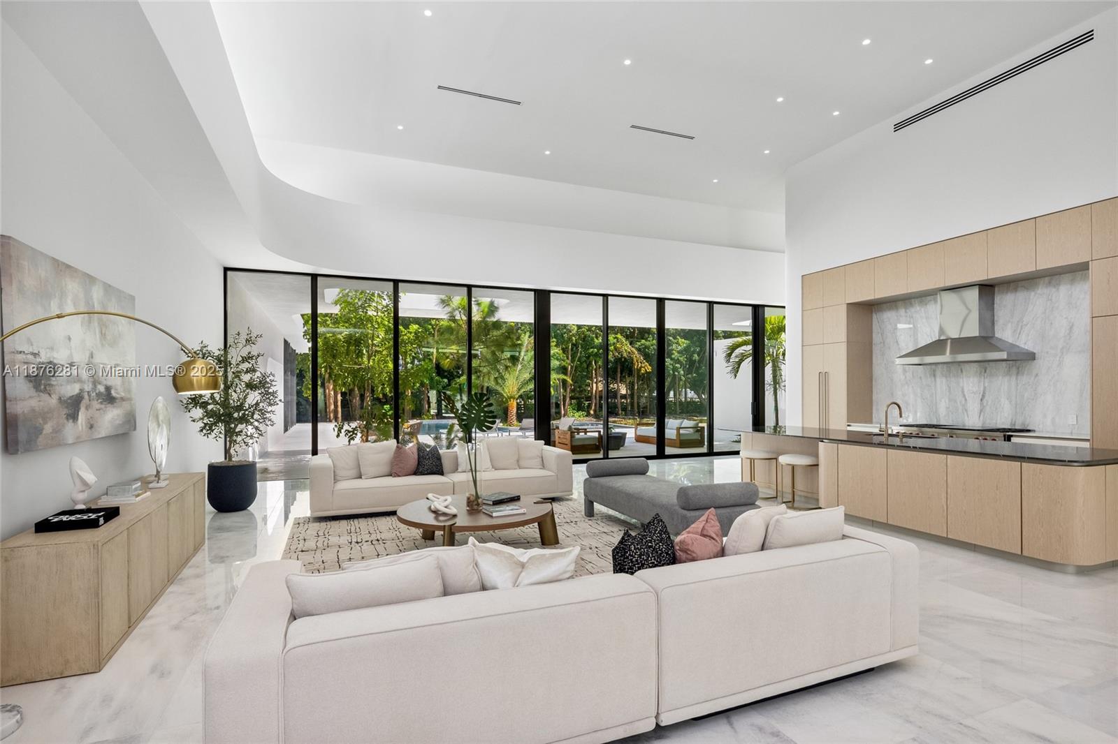 5671 Southwest 130th Avenue Southwest Ranches, FL 33330 - Photo 9 of 47 a living room with furniture and a large window
