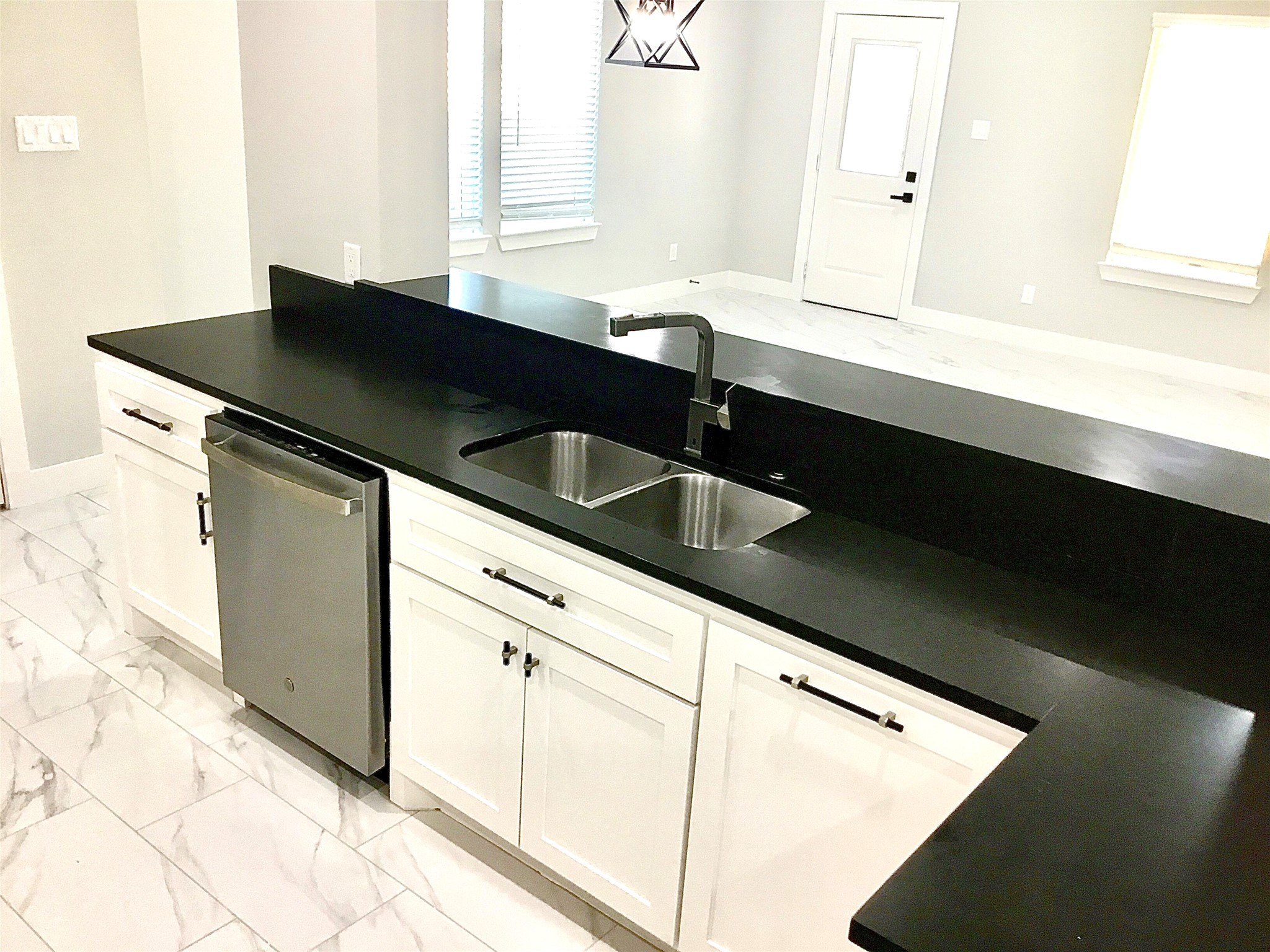 924 East 2nd Street Bellville, TX 77418 - Photo 11 of 38 a close view of sink and mirror