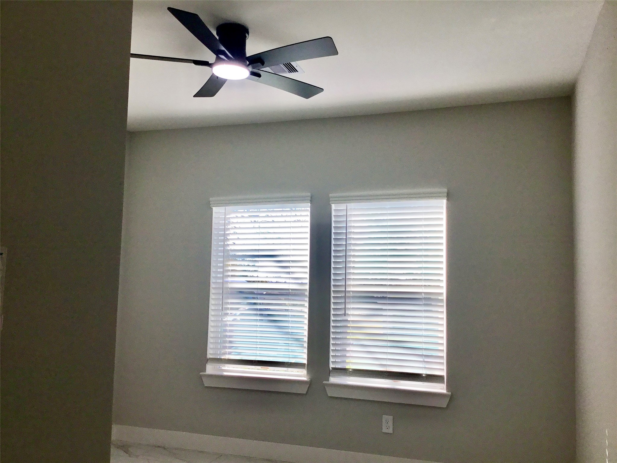 924 East 2nd Street Bellville, TX 77418 - Photo 18 of 38 a view of a livingroom with a ceiling fan and window