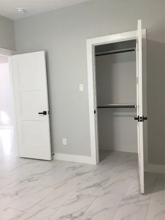 an empty room with an entryway
