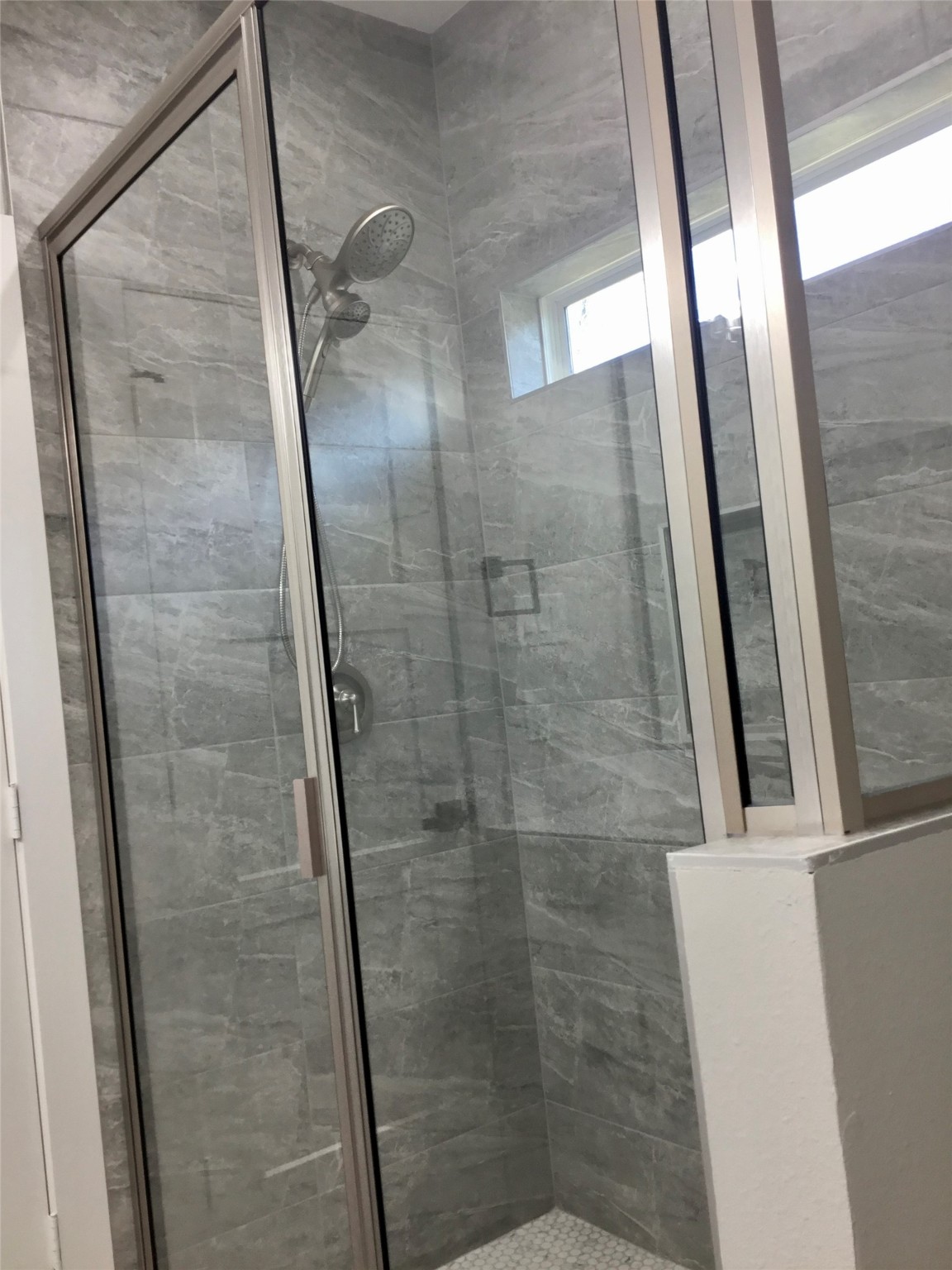 924 East 2nd Street Bellville, TX 77418 - Photo 29 of 38 a bathroom with a glass door shower and a sink