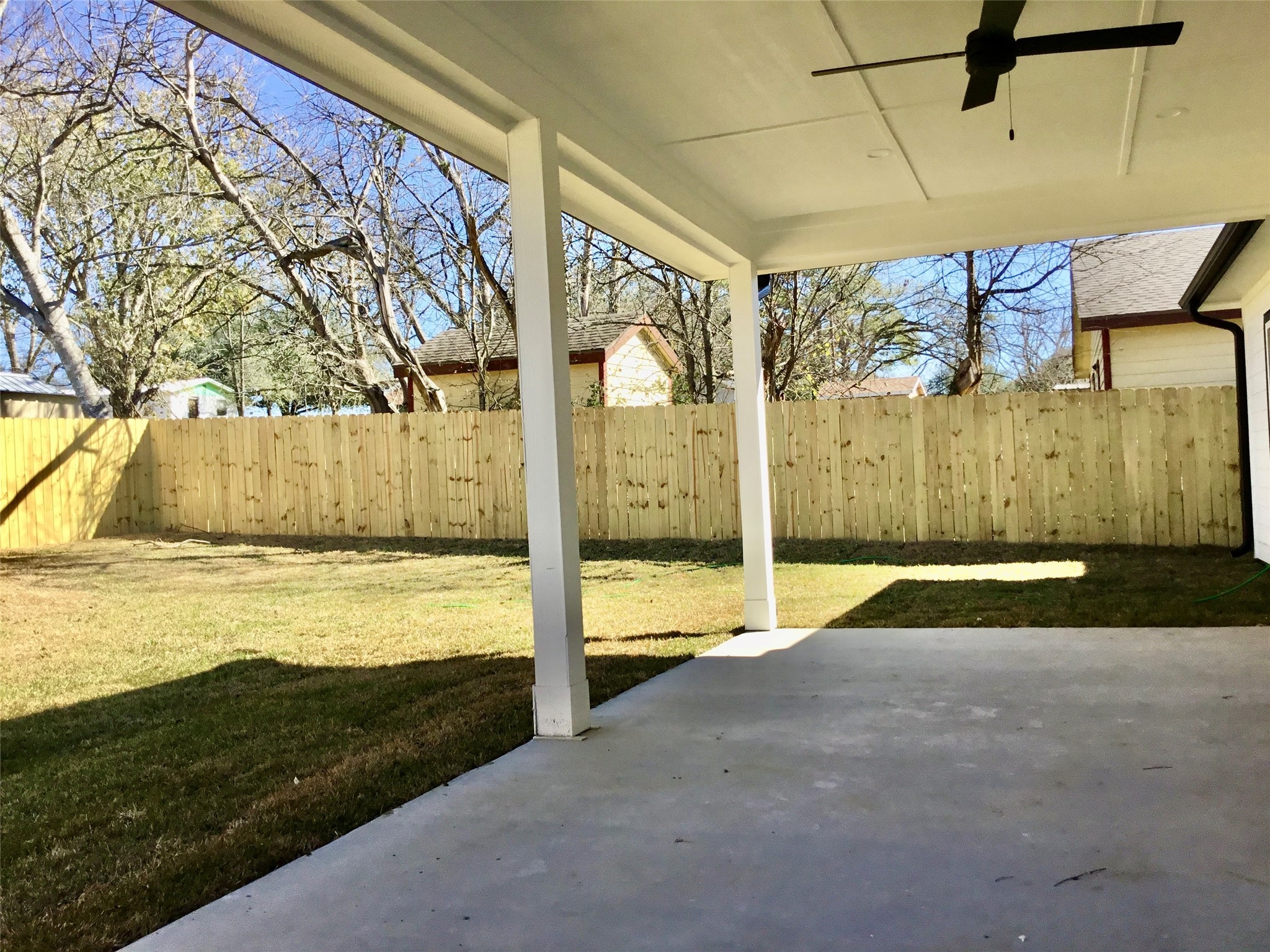 924 East 2nd Street Bellville, TX 77418 - Photo 32 of 38 a view of a swimming pool with an outdoor space and seating area