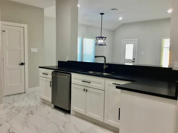 a close view of sink and mirror