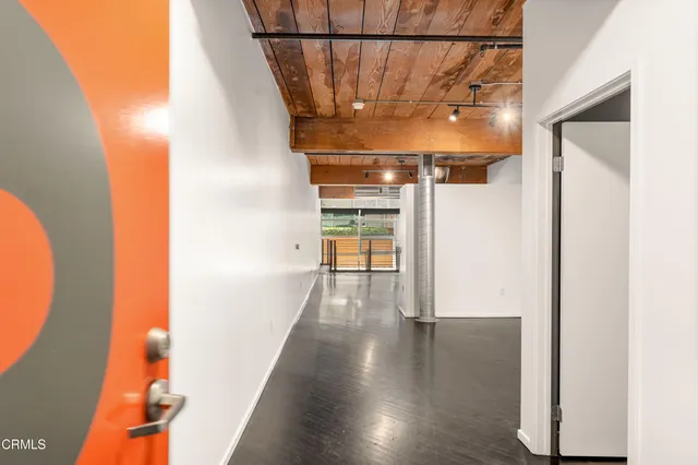 a view of entryway with wooden floor