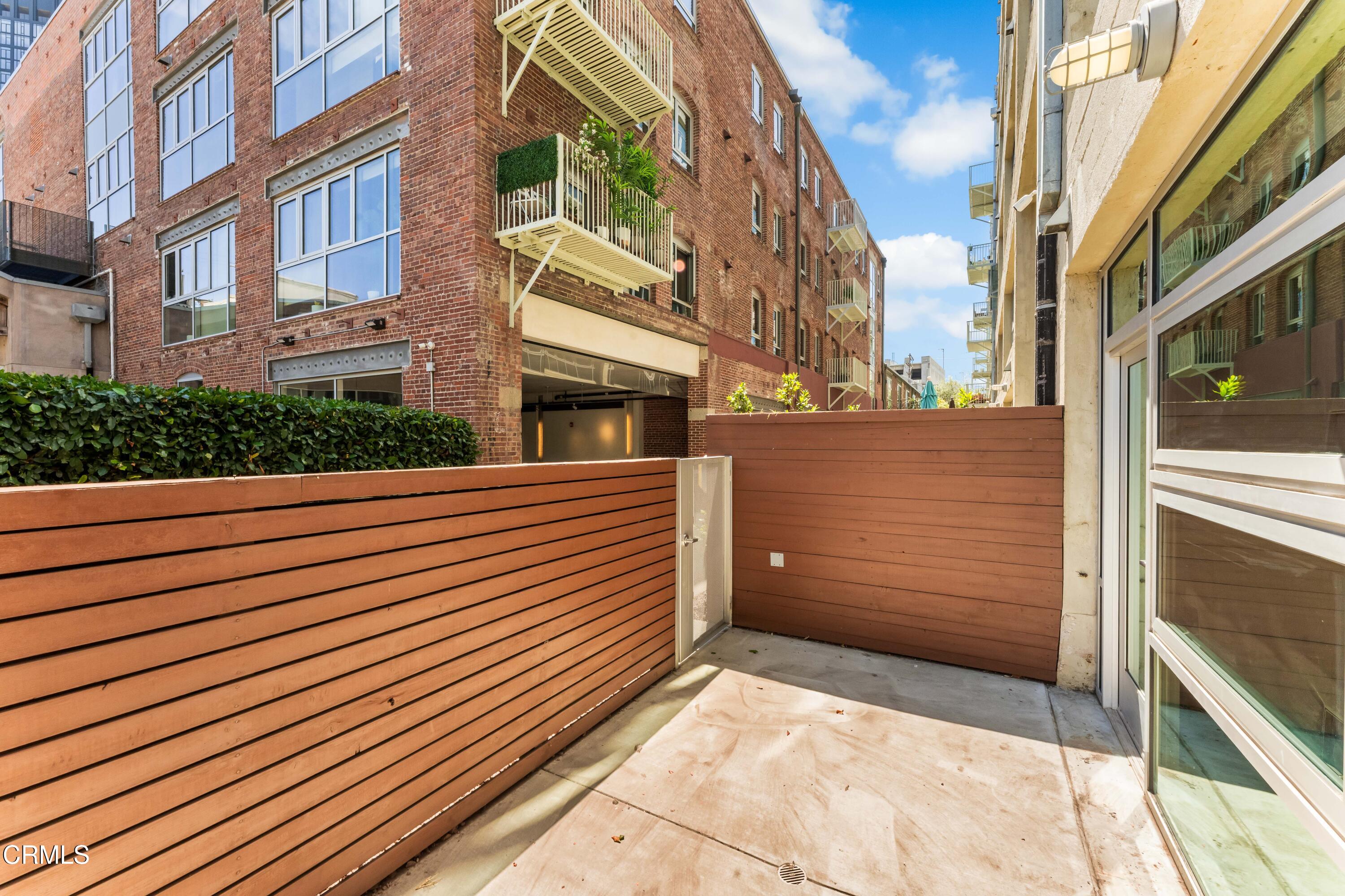 530 South Hewitt Street, Unit 130 Los Angeles, CA 90013 - Photo 28 of 53 a view of a street with an outdoor space