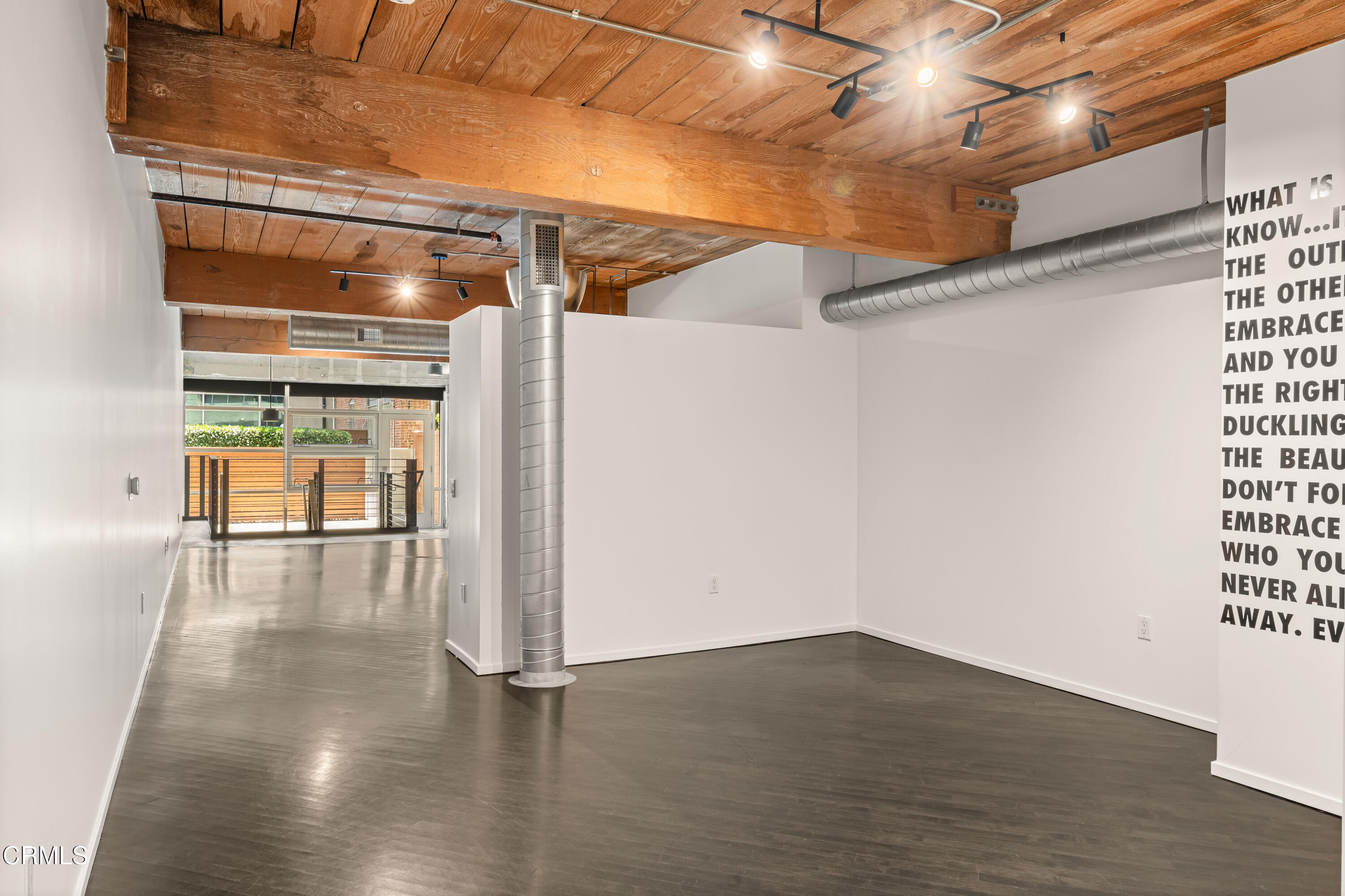 530 South Hewitt Street, Unit 130 Los Angeles, CA 90013 - Photo 3 of 53 a view of empty room with wooden floor