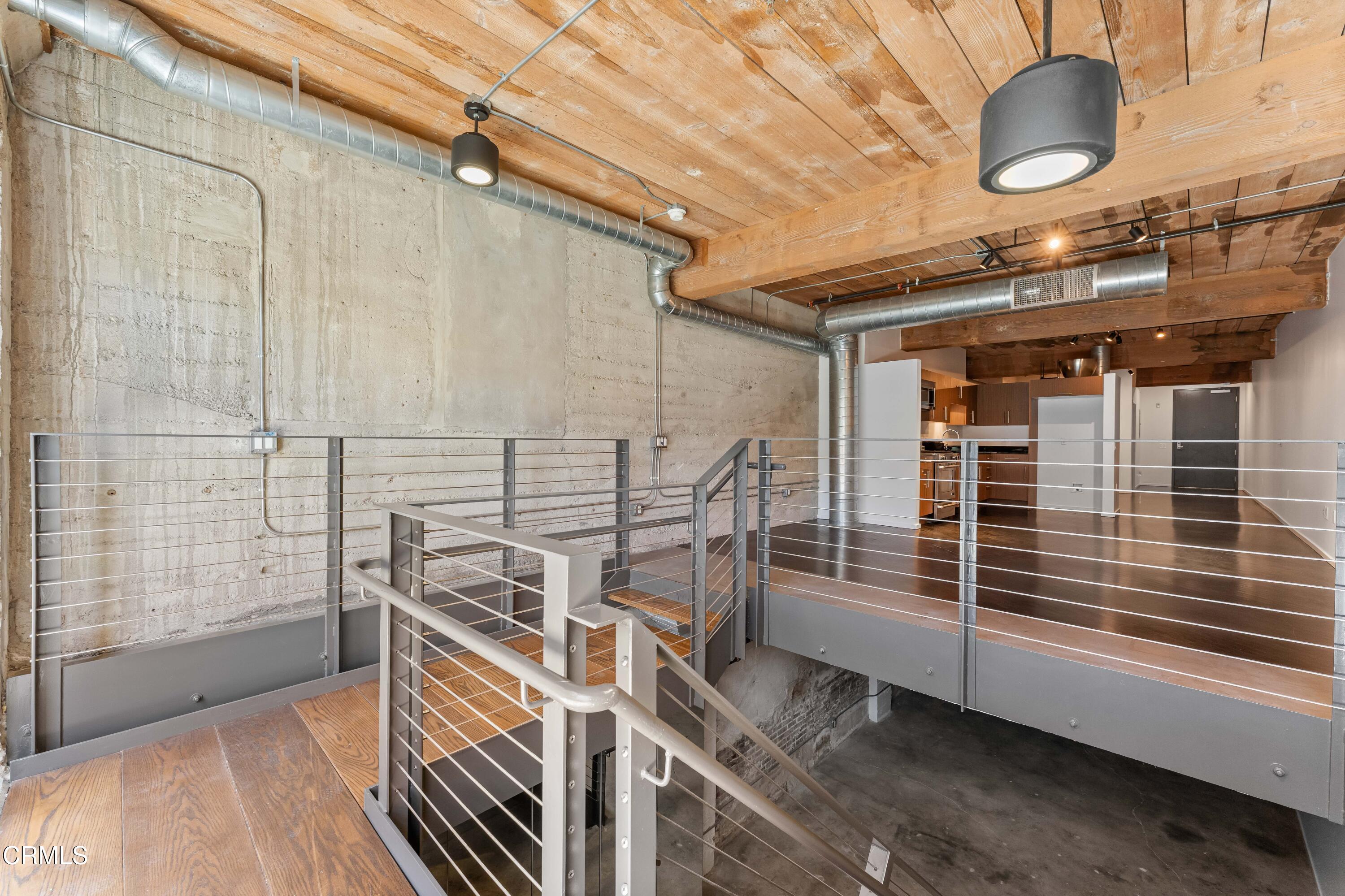 530 South Hewitt Street, Unit 130 Los Angeles, CA 90013 - Photo 31 of 53 a picture of a room with wooden floor