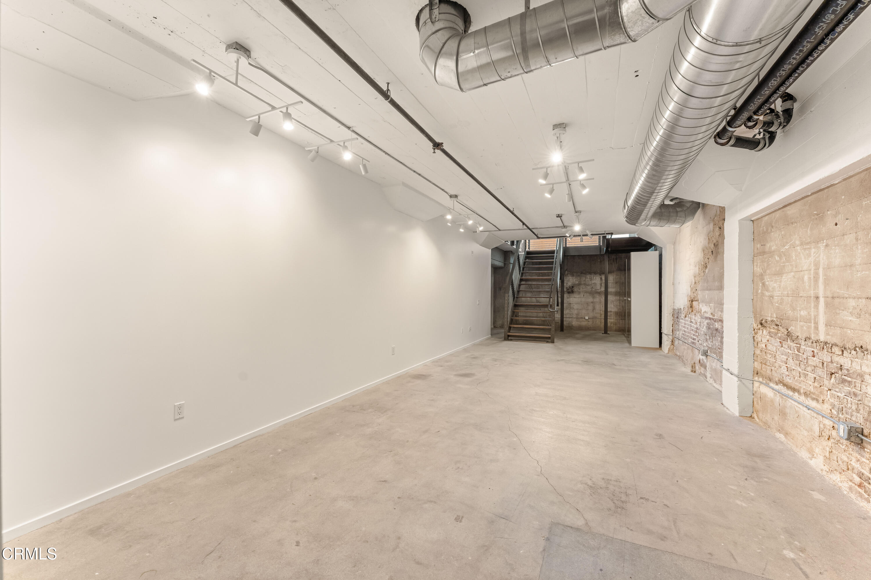 530 South Hewitt Street, Unit 130 Los Angeles, CA 90013 - Photo 37 of 53 a view of hallway with stairs