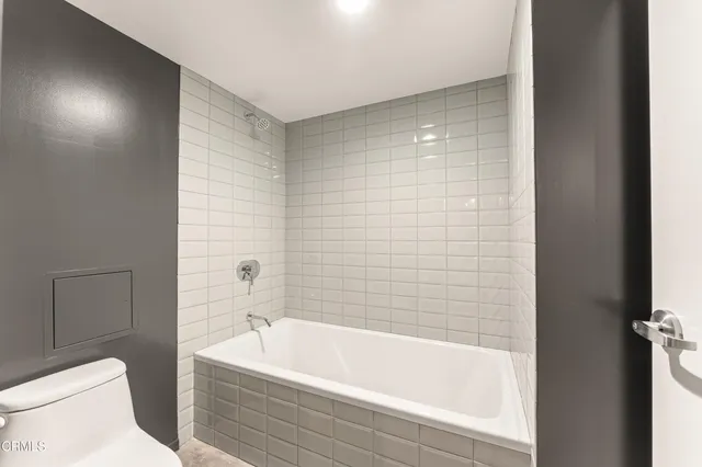 a view of a chairs and table in patio