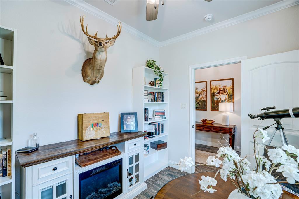 1355 Jay Bird Road Springtown, TX 76082 - Photo 10 of 40 a view of kitchen and living room with wooden floor