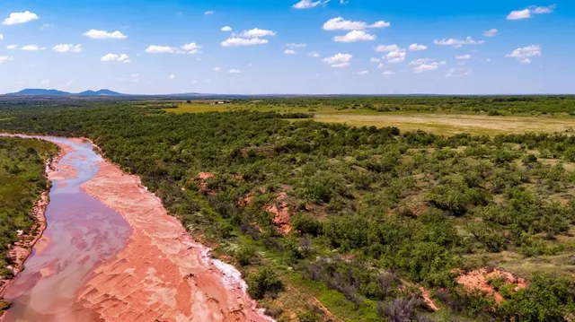 a view of an lake and outdoor space