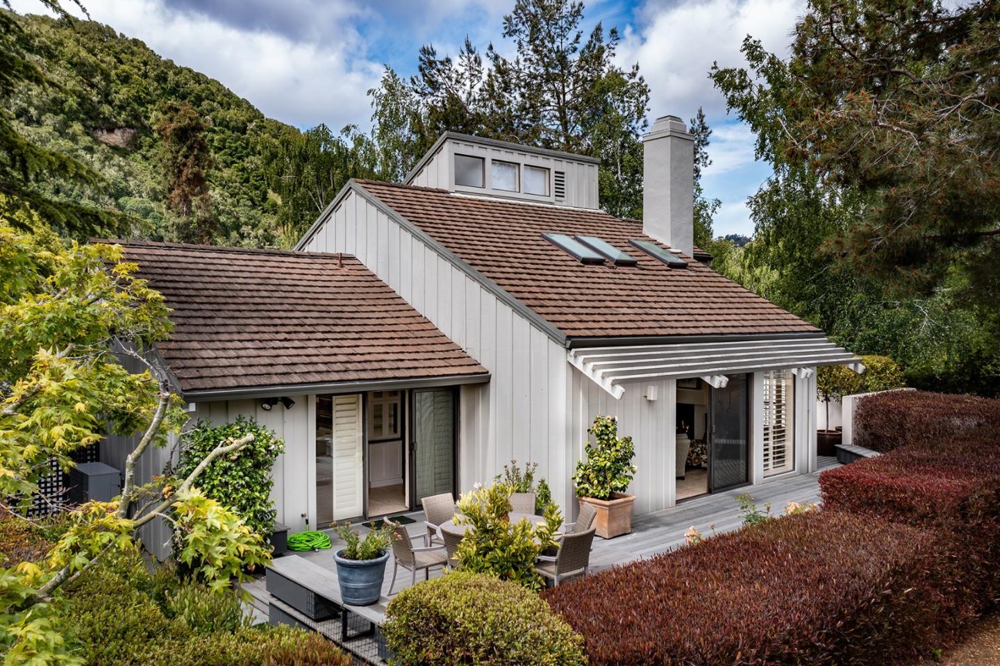 9621 Homestead Road Carmel, CA 93923 - Photo 1 of 30 a front view of a house with garden