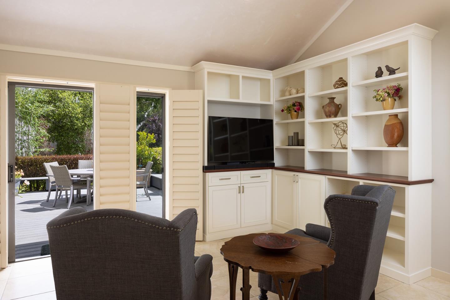 9621 Homestead Road Carmel, CA 93923 - Photo 15 of 30 a living room with furniture and a flat screen tv