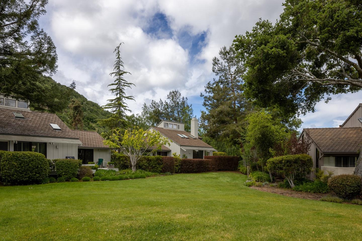 9621 Homestead Road Carmel, CA 93923 - Photo 28 of 30 a front view of a house with garden