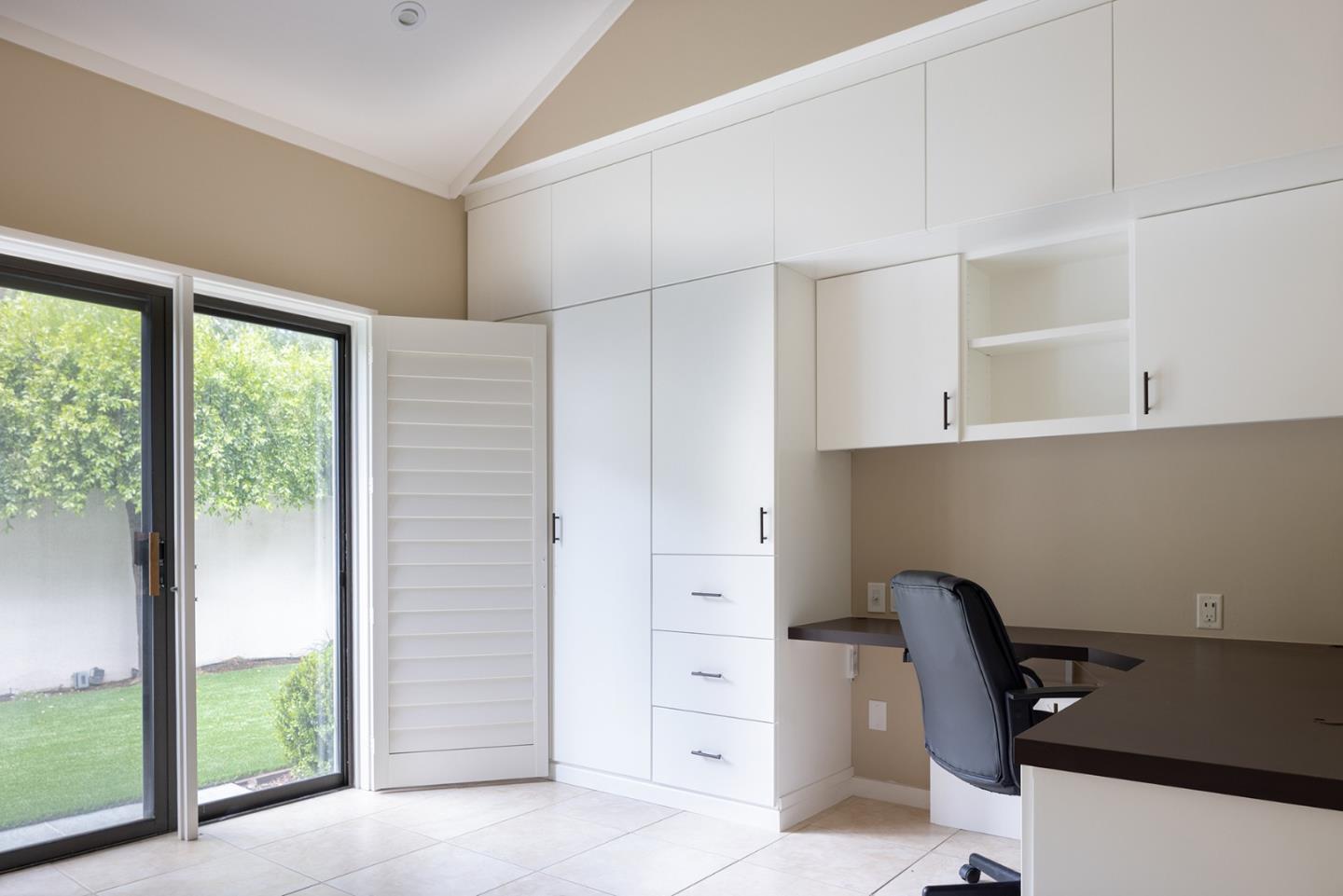 9621 Homestead Road Carmel, CA 93923 - Photo 6 of 30 a view of workspace with wooden floor and windows