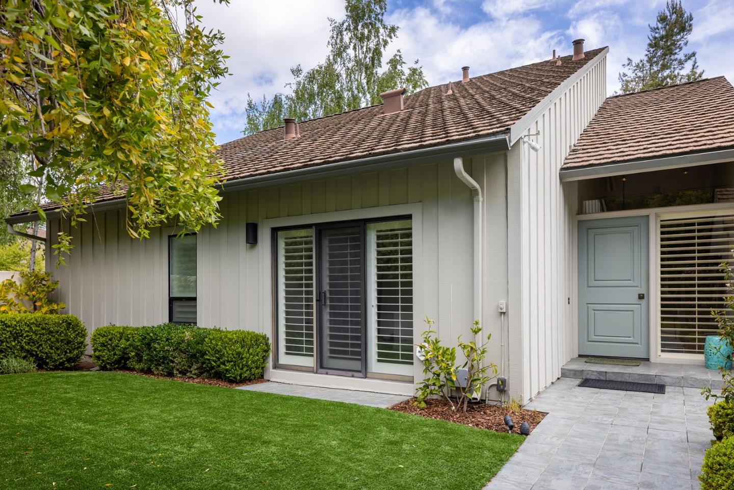 9621 Homestead Road Carmel, CA 93923 - Photo 9 of 30 a view of a house with a yard and plants