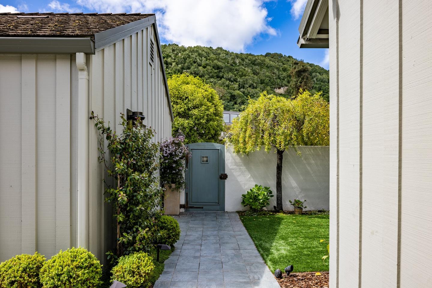 9621 Homestead Road Carmel, CA 93923 - Photo 10 of 30 a couple of potted plants in front of door