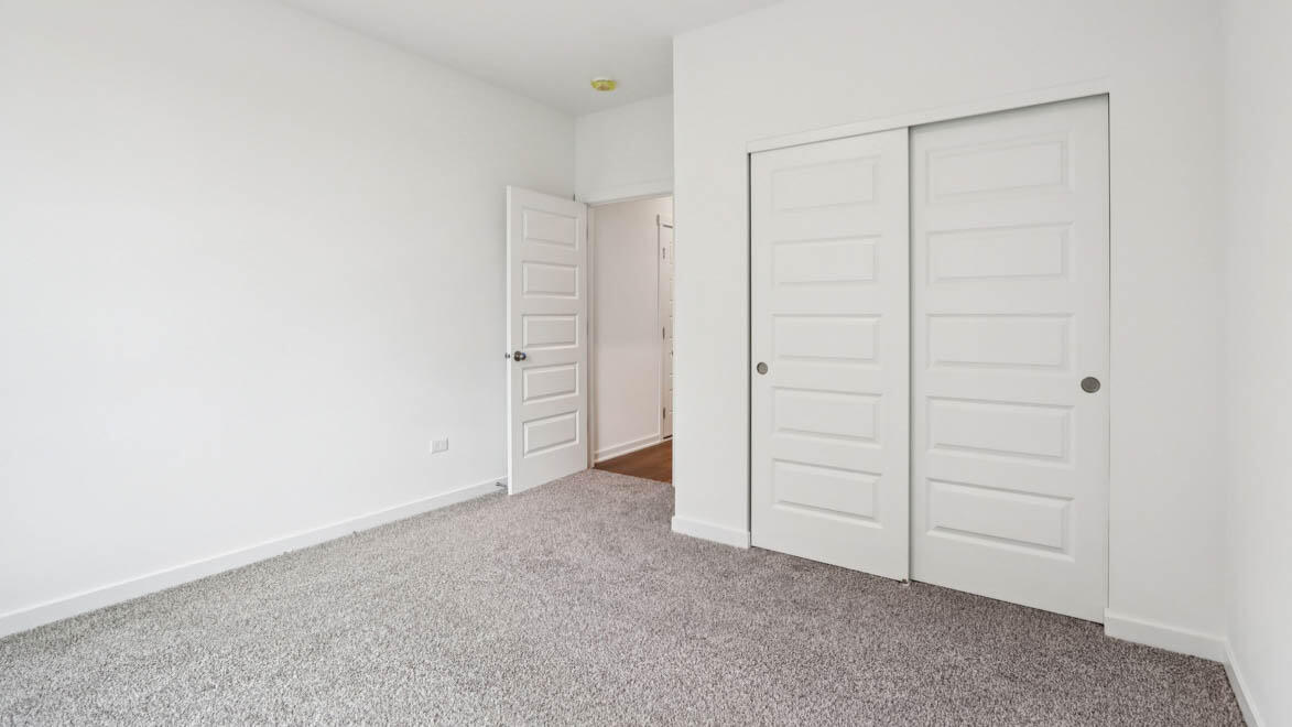 10347 Blaine Street Crown Point, IN 46307 - Photo 18 of 31 an empty room with closet