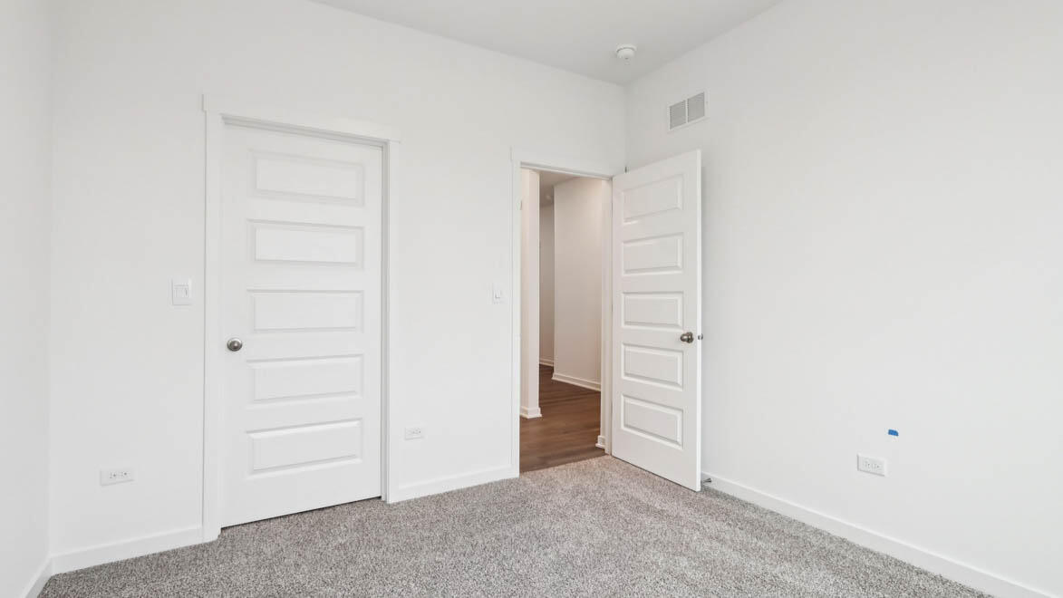 10347 Blaine Street Crown Point, IN 46307 - Photo 10 of 31 an empty room with closet