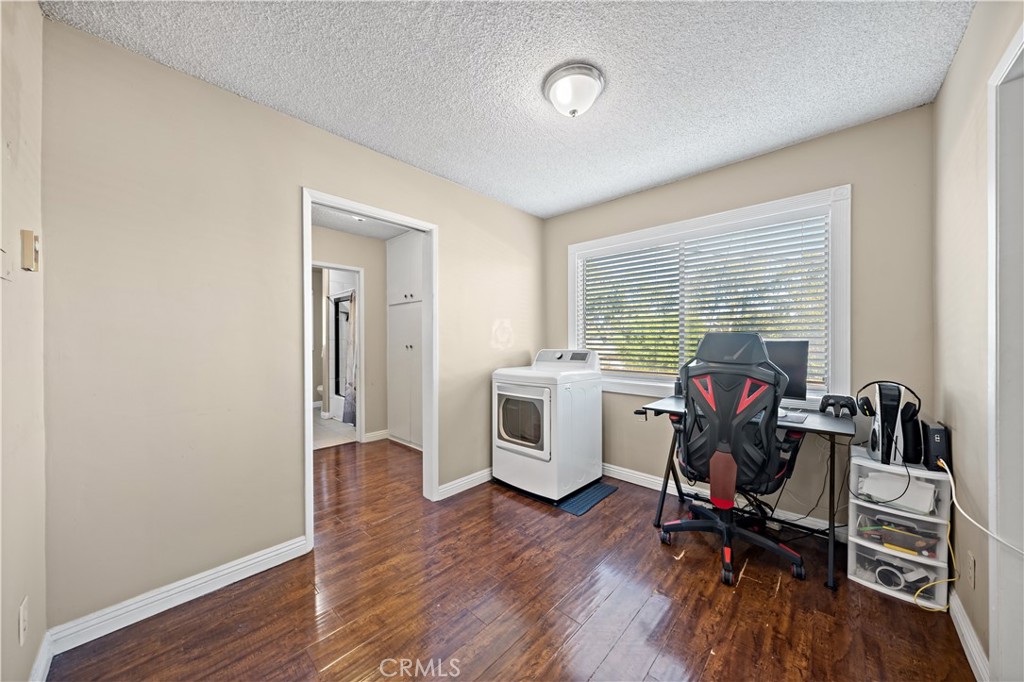 2018 Las Vegas Avenue, Unit 18 Pomona, CA 91767 - Photo 14 of 23 a view of a workspace with furniture and a window