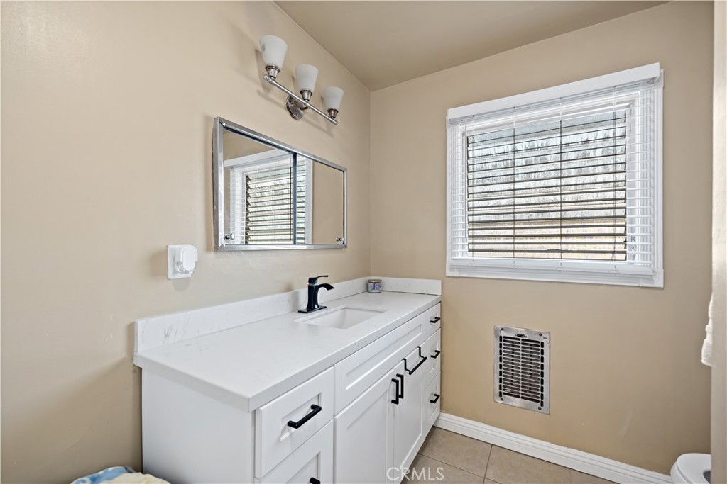 2018 Las Vegas Avenue, Unit 18 Pomona, CA 91767 - Photo 17 of 23 a bathroom with a sink and a window