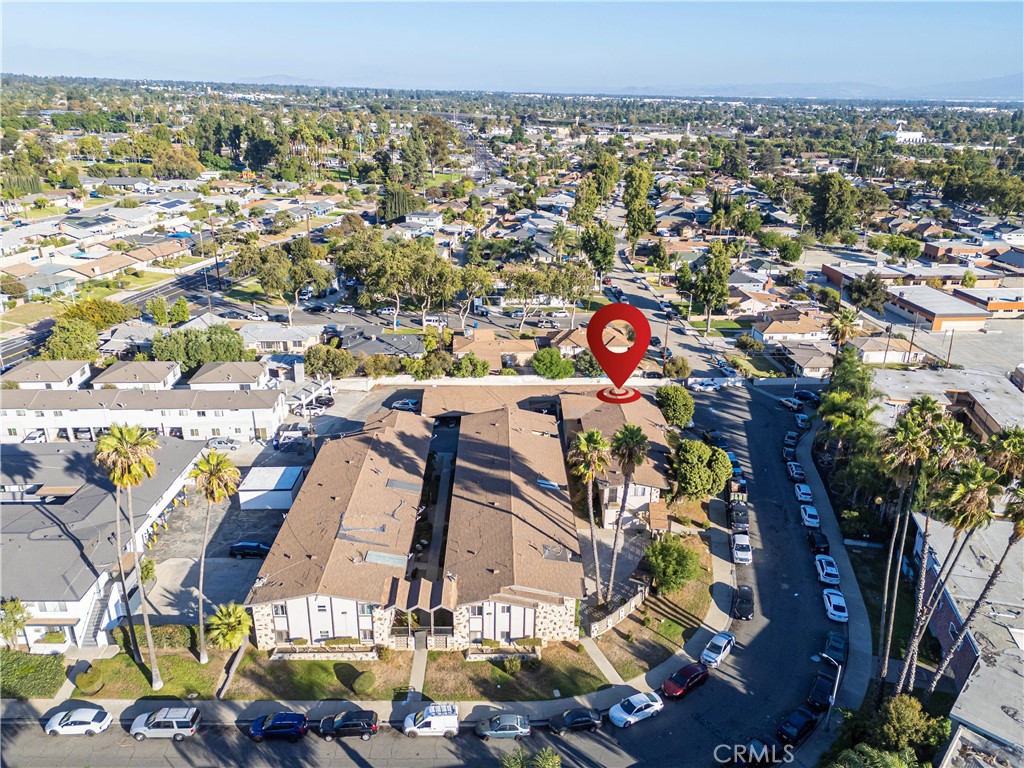 2018 Las Vegas Avenue, Unit 18 Pomona, CA 91767 - Photo 20 of 23 an aerial view of residential houses with outdoor space