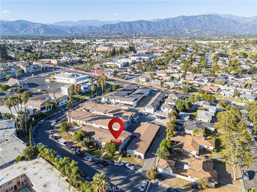 2018 Las Vegas Avenue, Unit 18 Pomona, CA 91767 - Photo 23 of 23 an aerial view of residential houses and outdoor space
