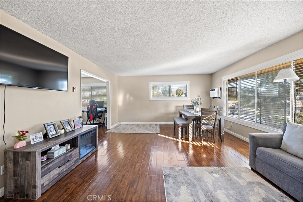 2018 Las Vegas Avenue, Unit 18 Pomona, CA 91767 - Photo 5 of 23 a living room with furniture and a wooden floor