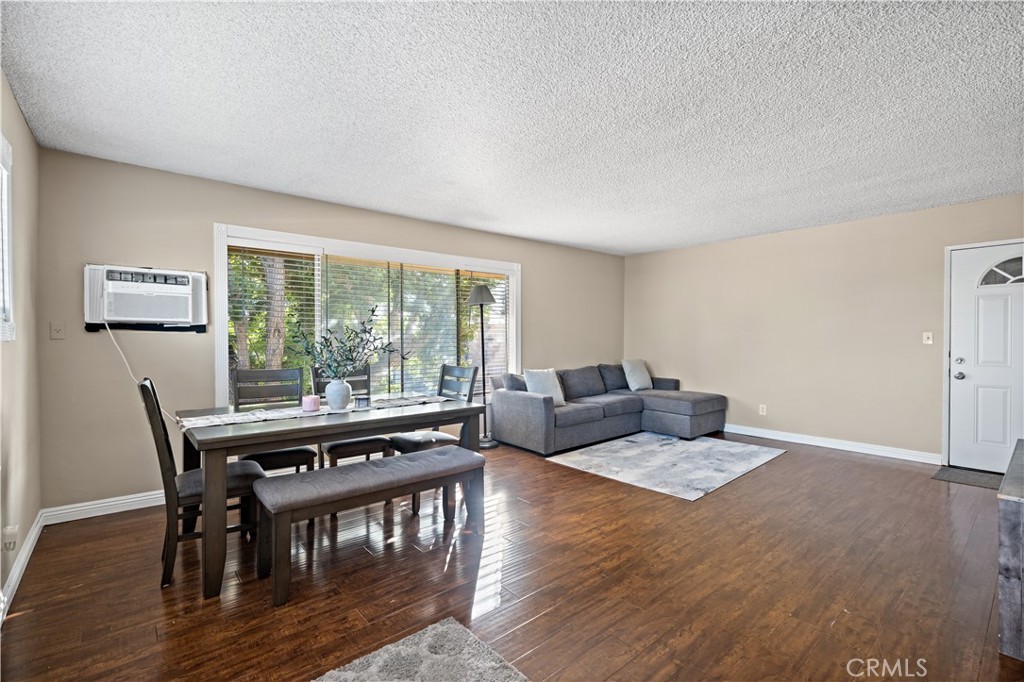 2018 Las Vegas Avenue, Unit 18 Pomona, CA 91767 - Photo 7 of 23 a living room with furniture and a large window