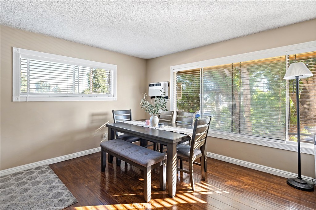 2018 Las Vegas Avenue, Unit 18 Pomona, CA 91767 - Photo 8 of 23 a dining room with furniture and wooden floor