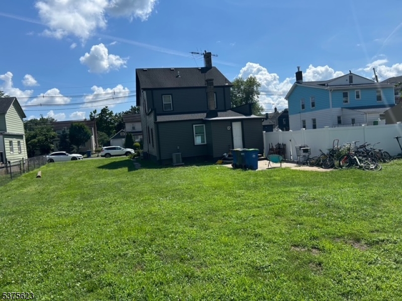 21 2nd Street Somerville, NJ 08876 - Photo 15 of 15 a view of a back yard of the house with a yard