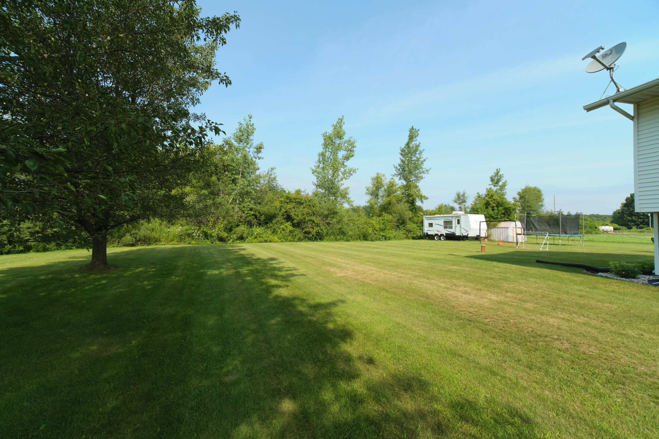 9418 Skeels Road Fremont, MI 49412 - Photo 15 of 59 Beautiful Side Yard