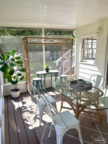 a dining room with furniture