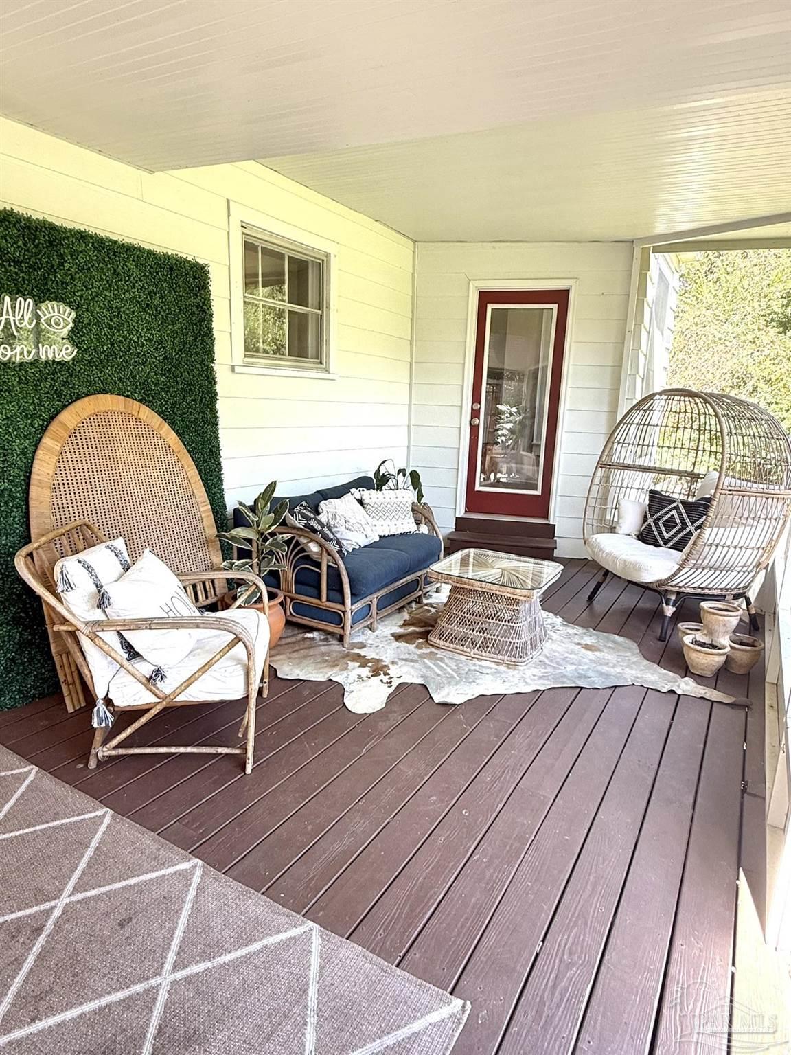 6855 Pine Street Milton, FL 32570 - Photo 18 of 31 a outdoor space with chairs