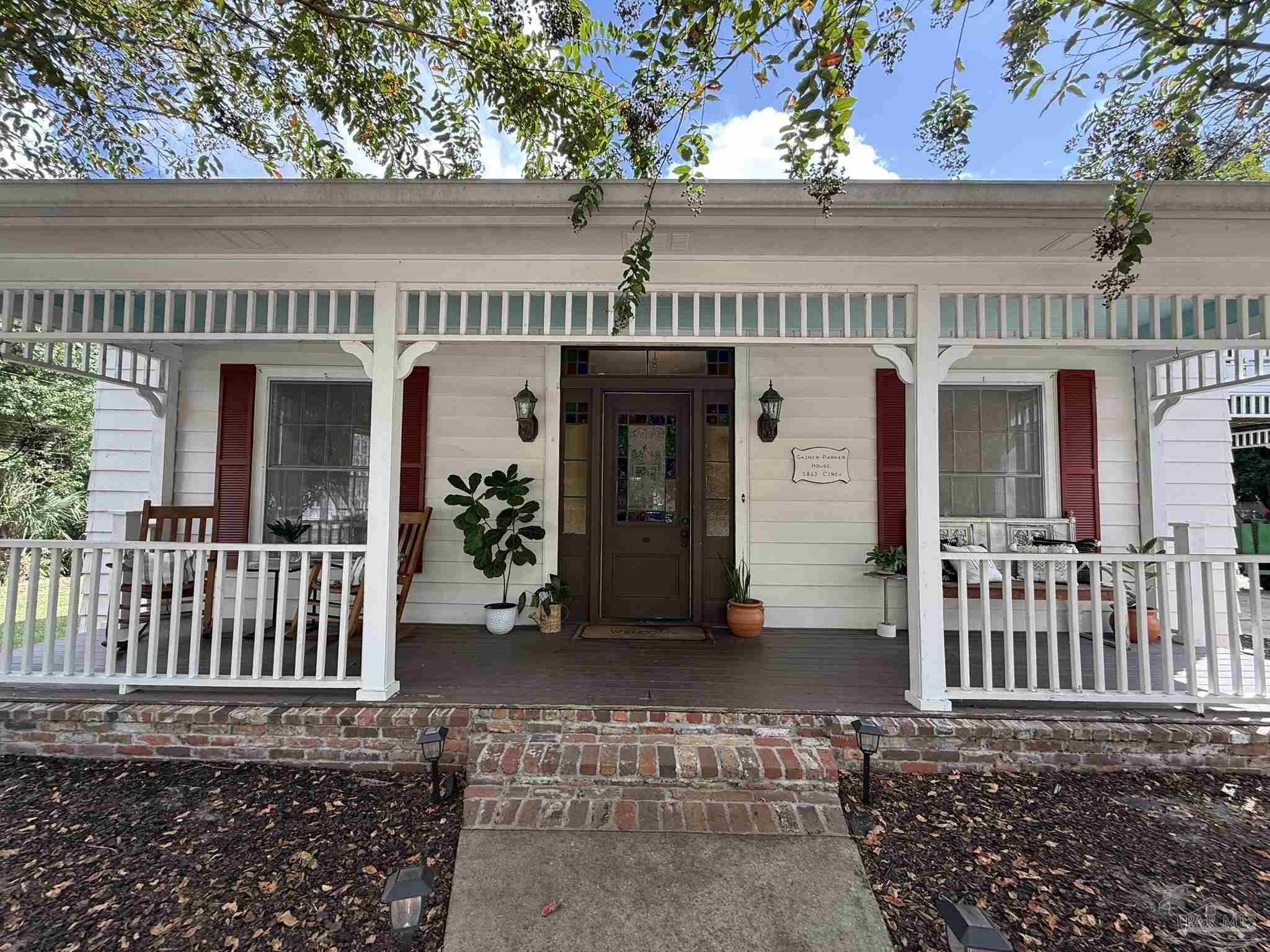 6855 Pine Street Milton, FL 32570 - Photo 2 of 31 a front view of a house