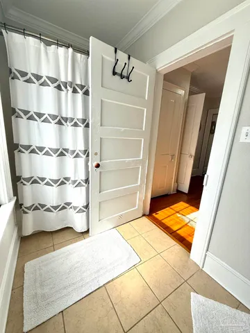 a living room with a rug