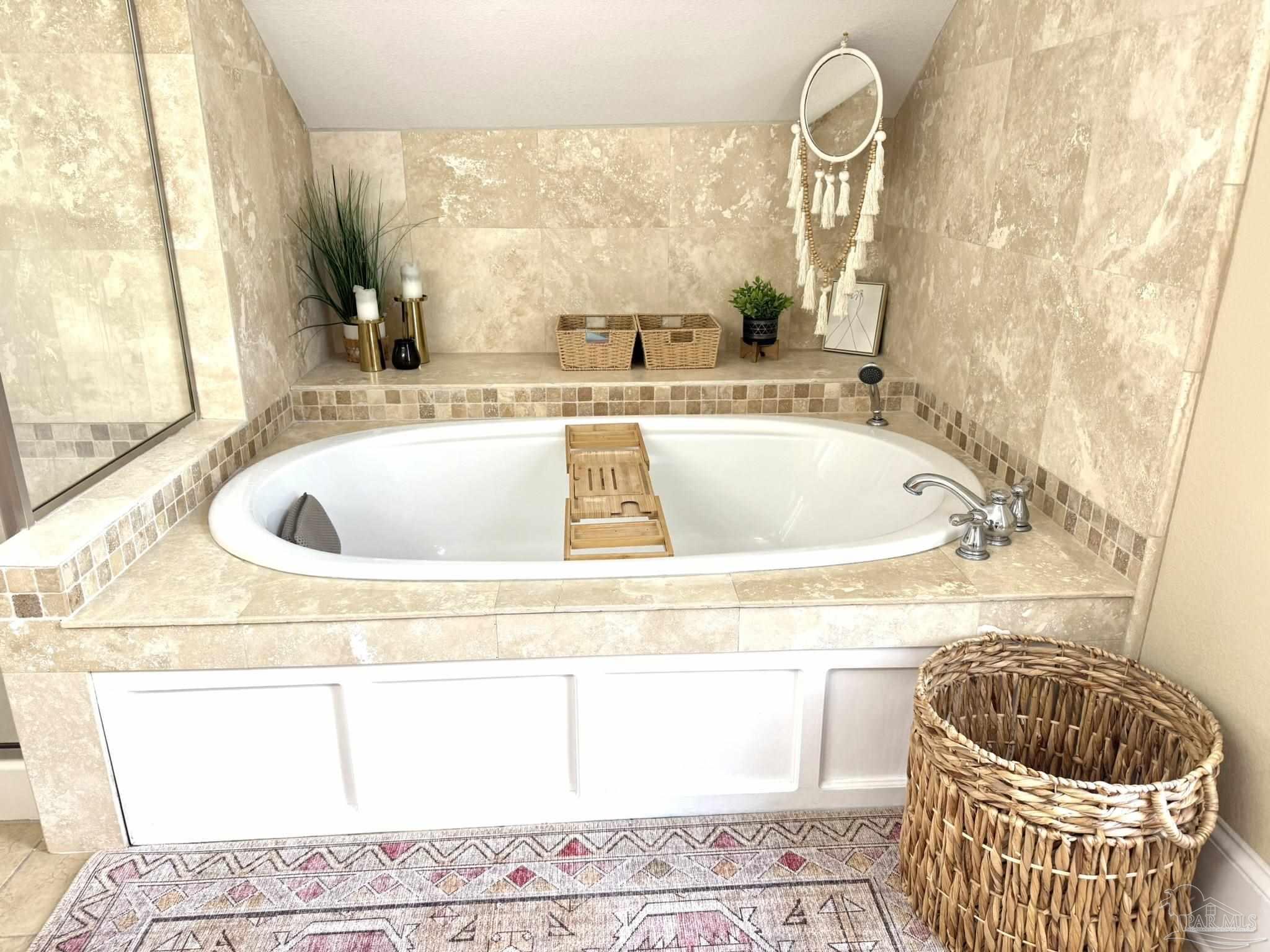 6855 Pine Street Milton, FL 32570 - Photo 29 of 31 a bath tub sitting next to a window