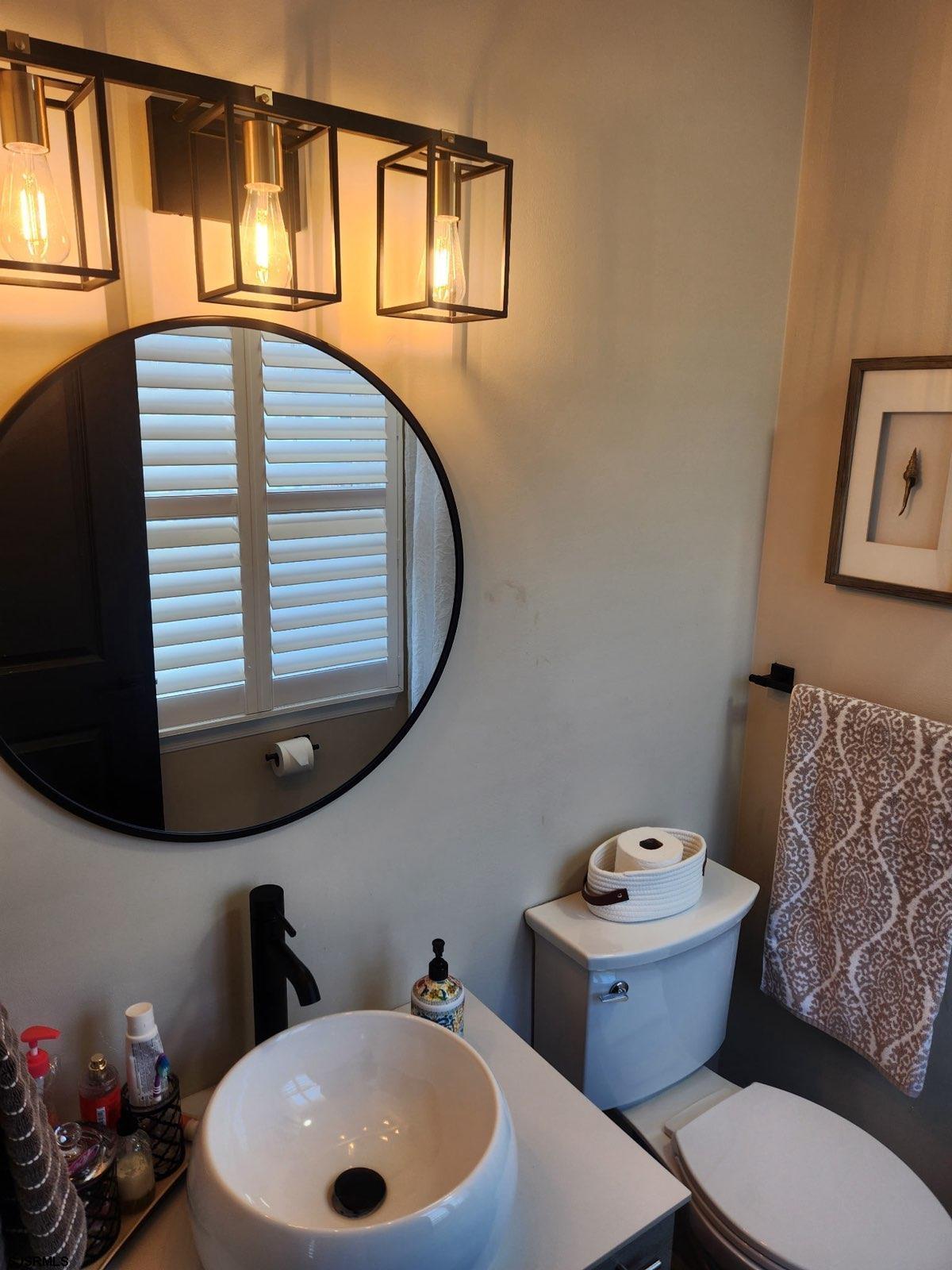 330 Gull Cove Brigantine, NJ 08203 - Photo 18 of 34 a bathroom with a toilet and a sink