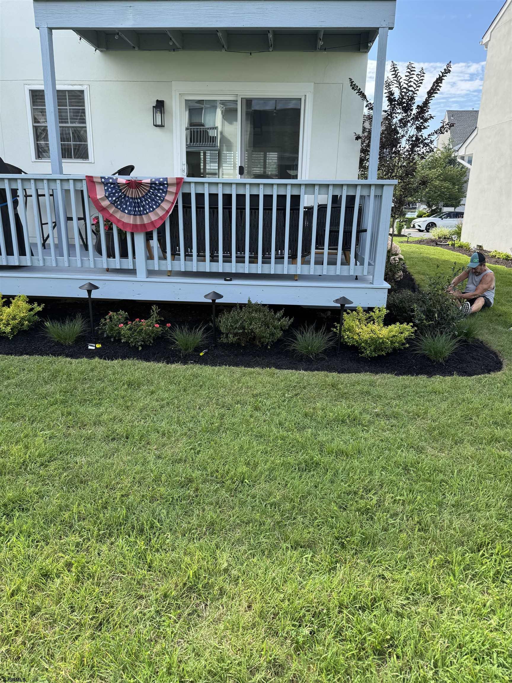 330 Gull Cove Brigantine, NJ 08203 - Photo 2 of 34 a view of backyard with deck and seating