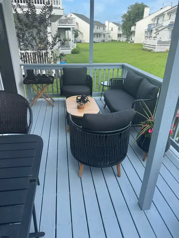 a view of a roof deck with couches