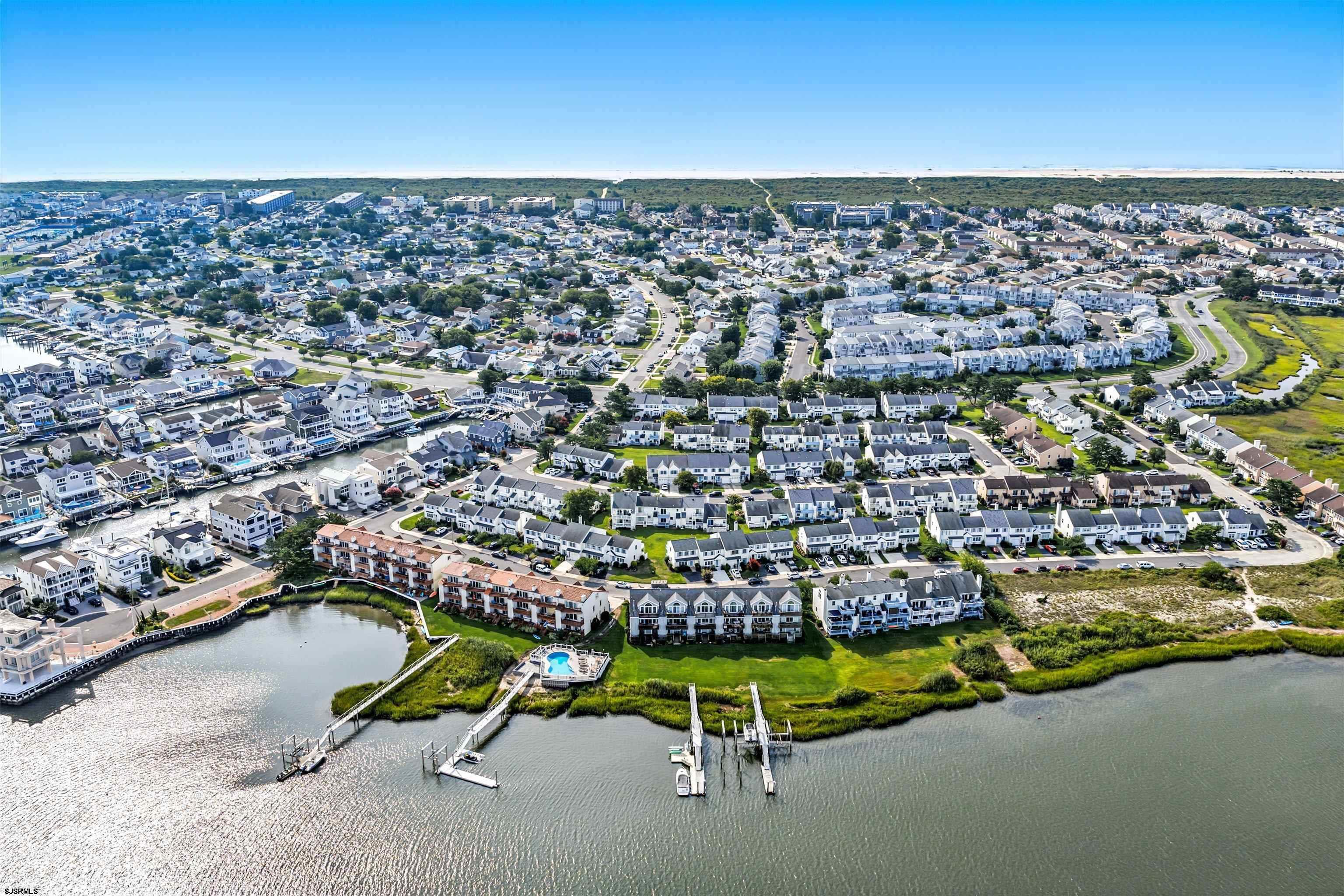 330 Gull Cove Brigantine, NJ 08203 - Photo 4 of 34 an aerial view of residential houses with outdoor space