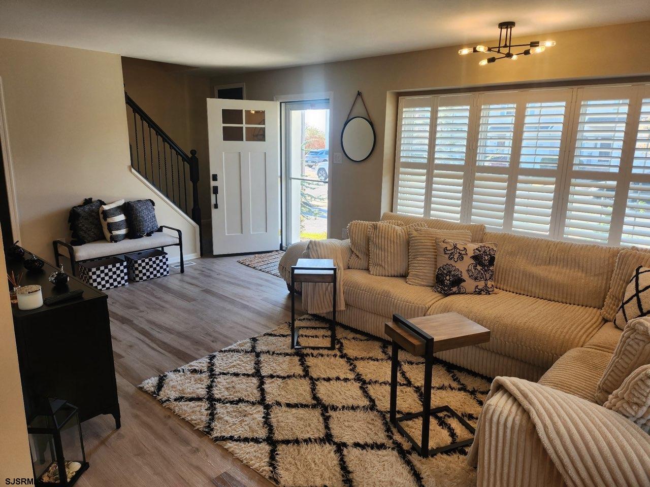 330 Gull Cove Brigantine, NJ 08203 - Photo 10 of 34 a living room with furniture and wooden floor